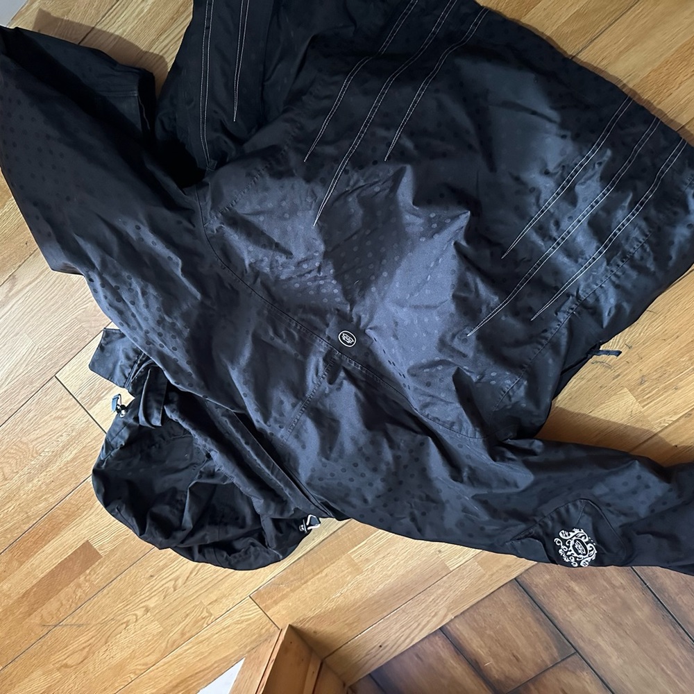 Woman’s ski pants and jacket